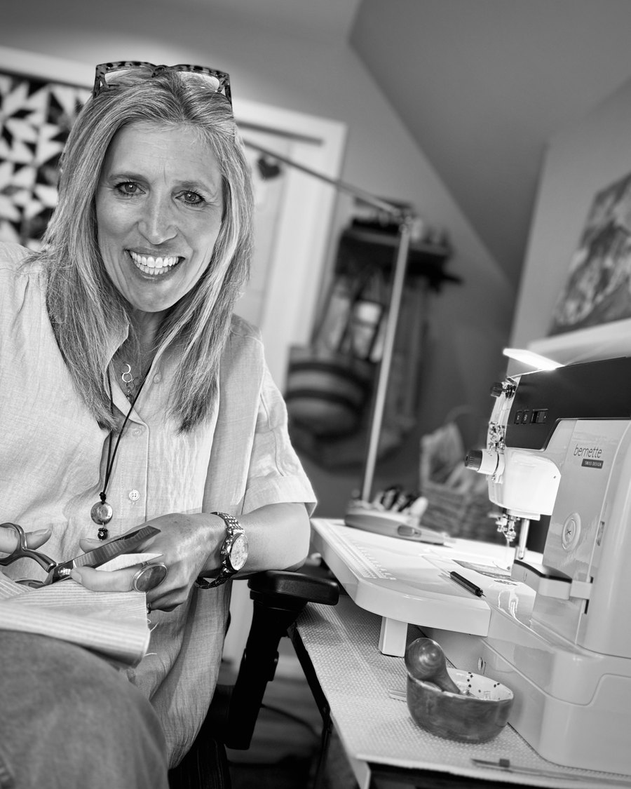 Jodi in her Seattle studio at her sewing machine